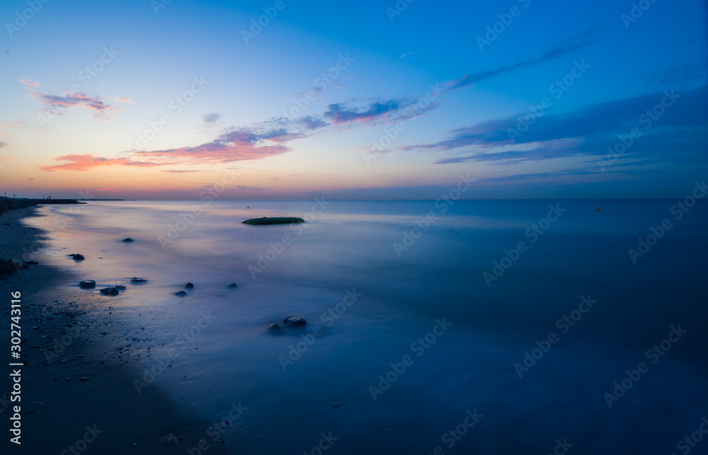 Obraz premium Amanecer en la playa de El Prat