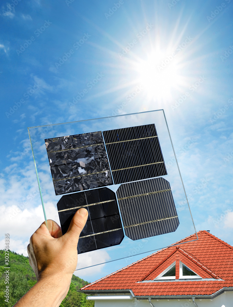 Hand holding samples of various solar cells of polycrystalline and ...