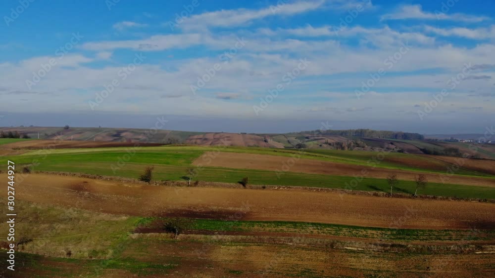 A flight over cultivated fields in the light of the autumn sun. A flight over cultivated fields in the light of the autumn sun.