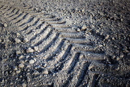 machine tread imprint on the field background