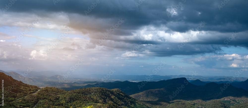 Overcast sky and cloud at the mountain range in the background Overcast sky and cloud at the mountain range in the background