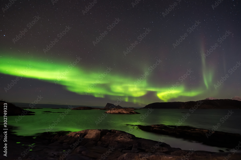 Northern Lights paint the sea