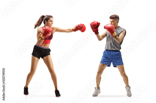 Young female and male practicing box © Ljupco Smokovski