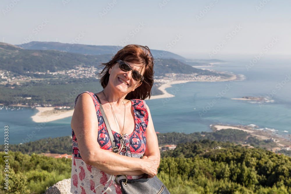 Portrait of woman on her vacation in Galicia, Spain