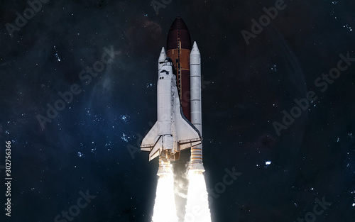 Fototapeta Naklejka Na Ścianę i Meble -  Space shuttle, nebulae, star clusters. Science fiction. Elements of this image furnished by NASA