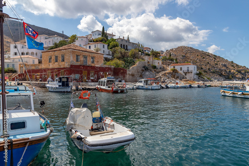 Buildings and Pier in Kamini beach in Hydra Island photo