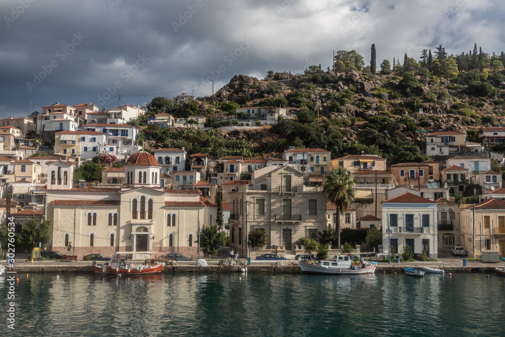 Boats and houses in a village in Poros Island