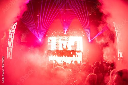 DJ with Hands Up at Concert with Cryo Cannons (CO2 cannons)