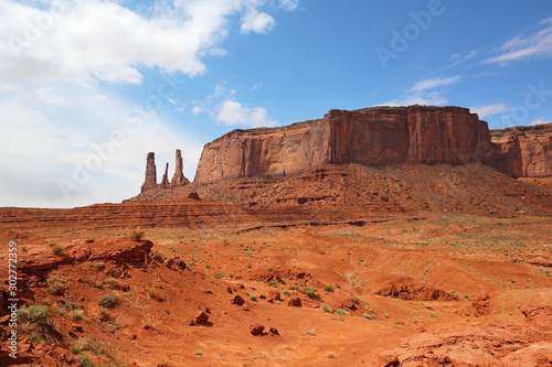 Three Sisters and Mitchell Mesa - Monument Valley, Utah