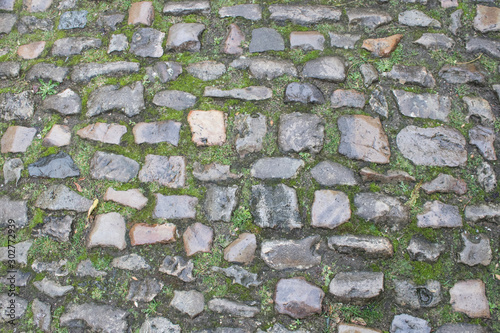 Pavement block street wet dirt old antique roman road