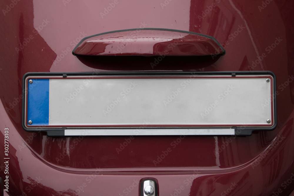 Naklejka premium Vintage Car Behind Empty Mockup Advertising Space Public Transportation Vehicle Close Up License Plate