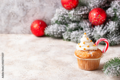 Christmas festive cupcake with candy cane
