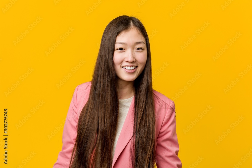 Young asian woman wearing a business suit Young asian woman wearing a business suit