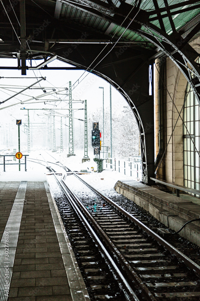 Train platforme with semaphore on snowy winter day Train platforme with semaphore on snowy winter day