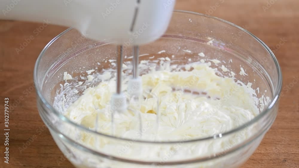 Mix the cream for the cake, Mixing cream. Mix the cream for the cake, Mixing cream.