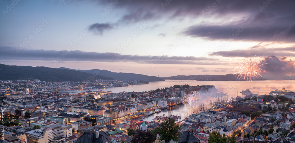 Cityscape of Bergen with fireworks during Tall Ship Races