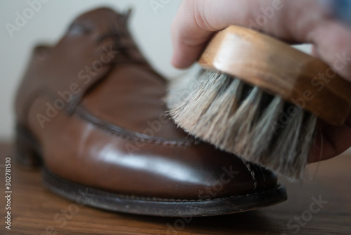 Shoes Shining with horse brush