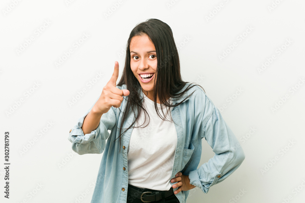 Young hispanic woman having an idea, inspiration concept. Young hispanic woman having an idea, inspiration concept.