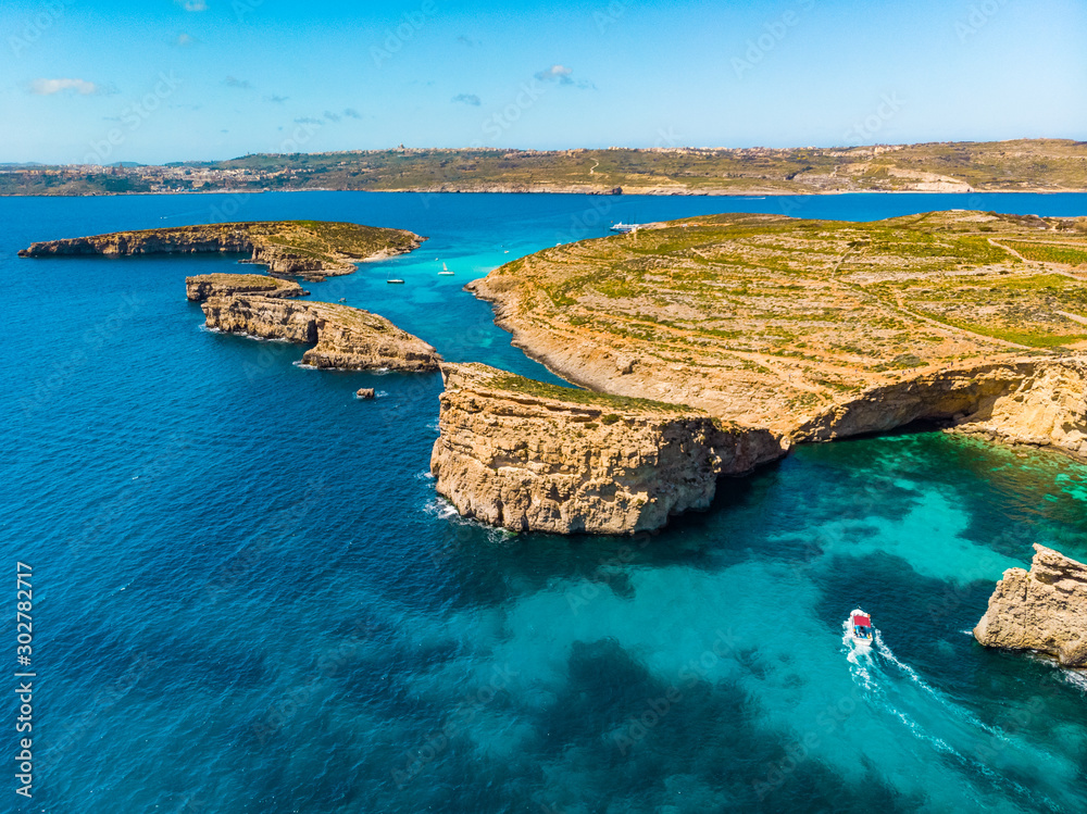 Aerial view of Comino island and boat. Drone landscape. Europe. Malta  country Photos | Adobe Stock
