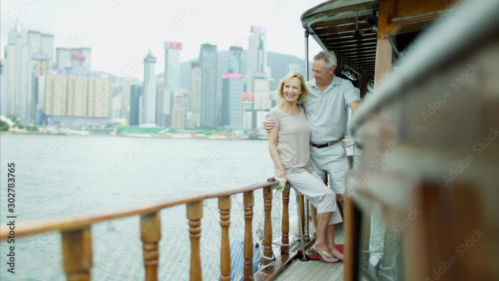 Senior couple enjoying the skyline Hong Kong Asia Senior couple enjoying the skyline Hong Kong Asia