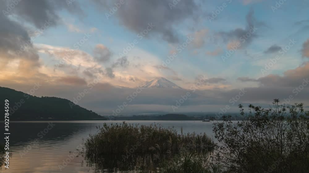 4K Time lapse landscape scene of mountain Fuji in the morning. Mt. Fuji at Lake Kawaguchi, Japan in autumn season. 4K Time lapse landscape scene of mountain Fuji in the morning. Mt. Fuji at Lake Kawaguchi, Japan in autumn season.