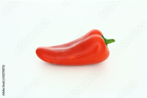 Fresh vegetables - red sweet pepper on white background - healthy food