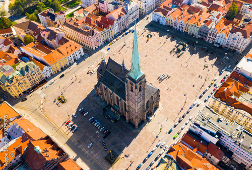 Aerial view to The cathedral of St. Bartholomew. Gothic church located on the Main Square in Pilsen.  Spire height is 102.3 m. Beautiful Czech landmark. photo