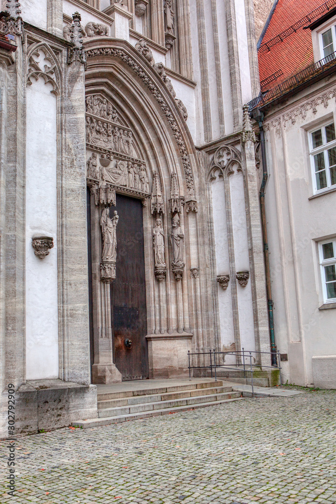 cathedral entrance with stone stairs in gothic style