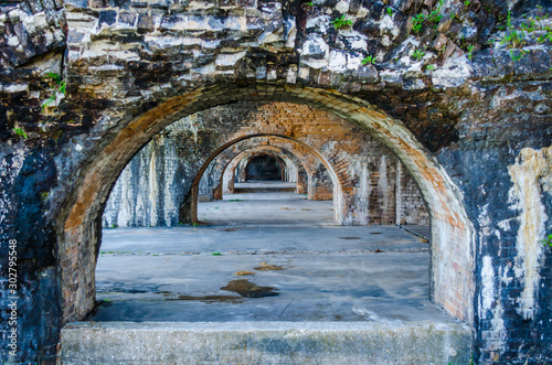 Fort Pickens structure located near Pensacola, Florida, USA. Beautiful weathered brick arches at scenic historic tourist destination location. 