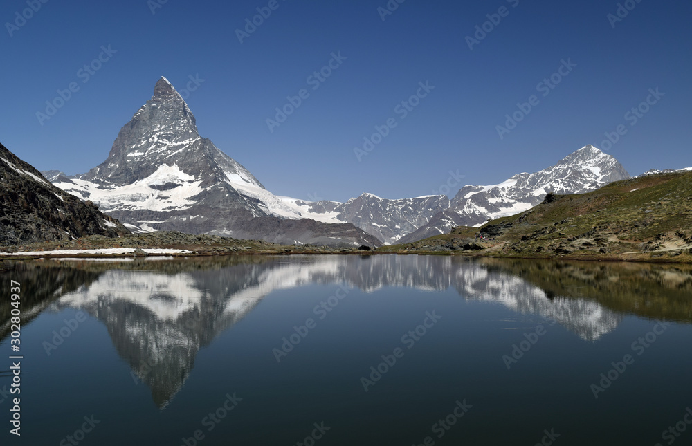Naklejka premium the reflection of the Matterhorn on the surface of Riffelsee. Switzerland