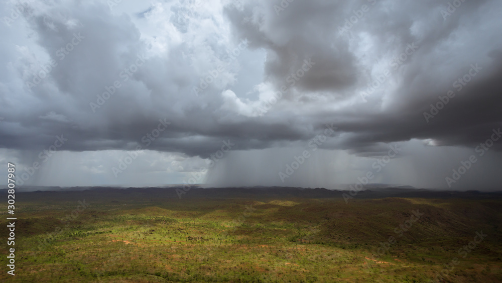 Aerial view from a helicopter of Wet Season thunderstorms near Warmu in the remote Kimberley region of Western Australia. Aerial view from a helicopter of Wet Season thunderstorms near Warmu in the remote Kimberley region of Western Australia.
