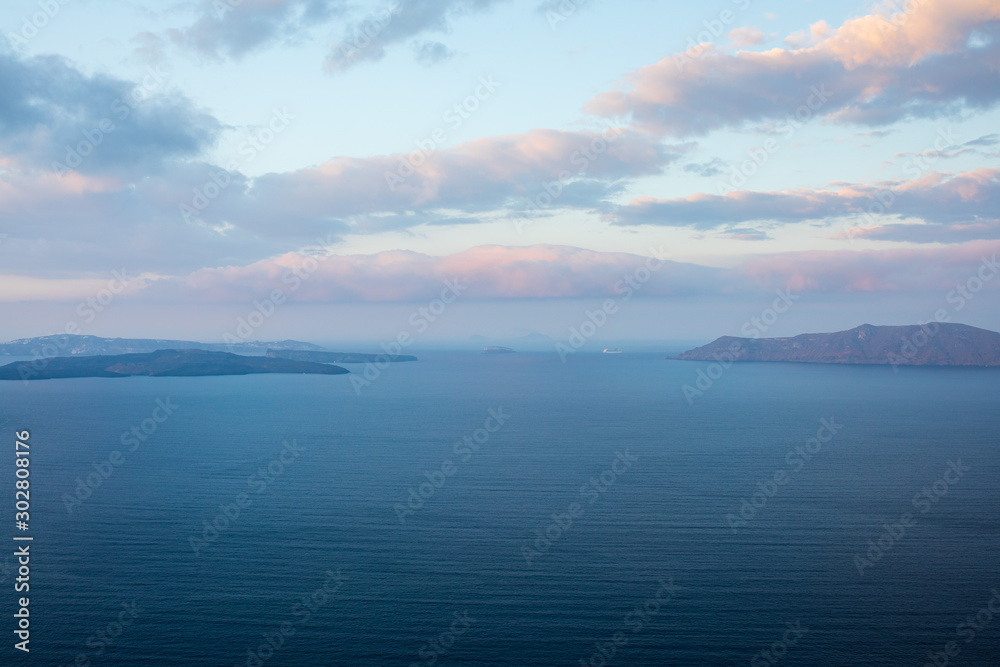 Islands in the mediterranean sea during sunrise. 