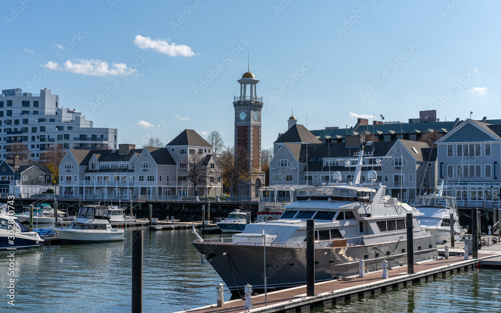 View of harbor boats and yacht, Clock tower in marina bay, Boston massachusetts
