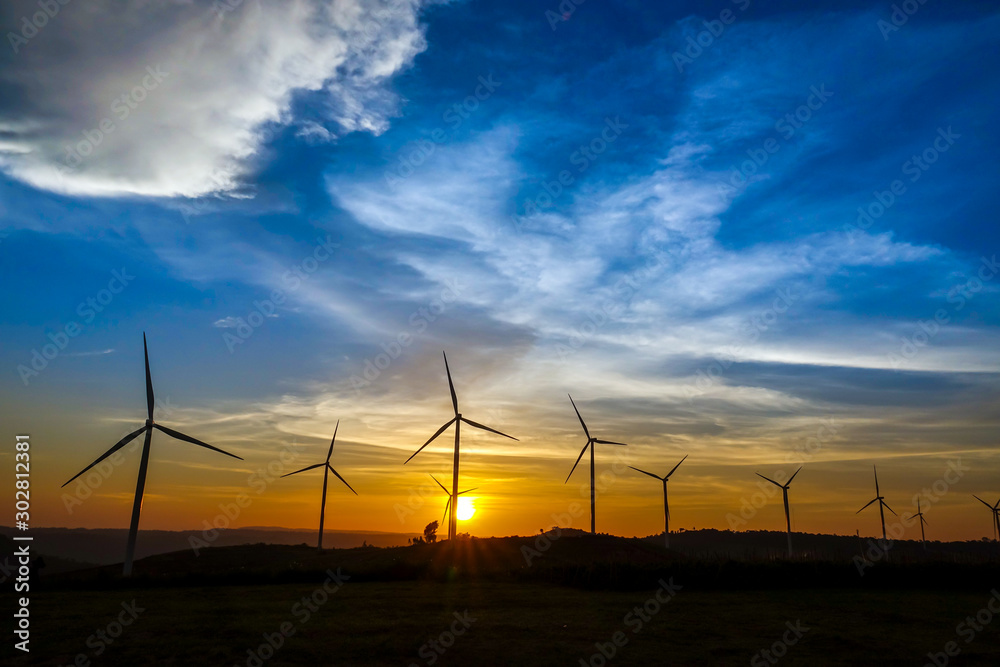 Obraz premium Wind turbine farm from clean energy. Wind power for electricity.