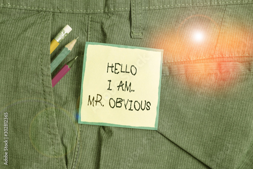 Text sign showing Hello I Am Mrobvious. Business photo showcasing introducing yourself as pouplar or famous demonstrating Writing equipment and green note paper inside pocket of man work trousers
