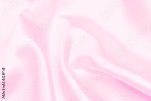 Plastic pink satin fabric texture soft blur background