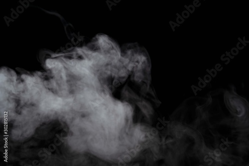 Abstract powder or smoke effect isolated on black background,Out of focus