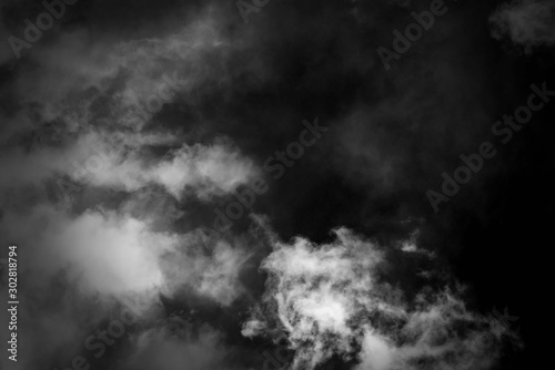 white cloud and black sky textured background photo