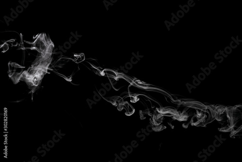 Abstract powder or smoke effect isolated on black background