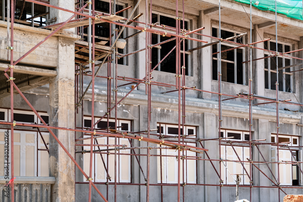 scaffolding at construction site of a building scaffolding at construction site of a building