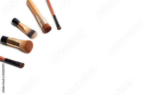Set of make up brushes for face and eyes. Essential tools for applying make up product on face. Make up banner with copy and design space.