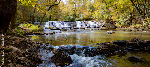 Fotografie, Obraz Waterfall and stream with rocks--wide angle