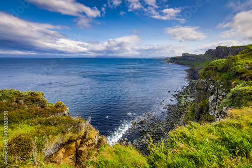 Waves breaking on coastal cliffs of Scotland.