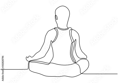 Man doing yoga exercise con...