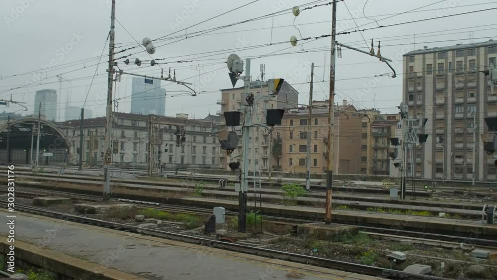 Leaving Milan Central Railway Station, Train Window Point of View. Milan, Lombardy, Italy Leaving Milan Central Railway Station, Train Window Point of View. Milan, Lombardy, Italy