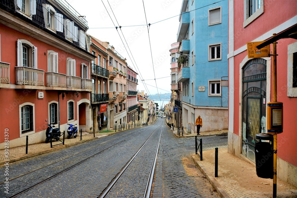 narrow street in the city of Lisbon Portugal