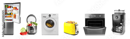 Fotografie Set of modern household appliances on white background