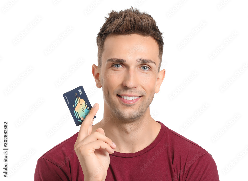 Young man with credit card on white background Young man with credit card on white background