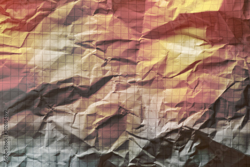 A sheet of multicolored crumpled paper. Creative background