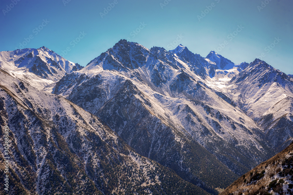 Amazing Natural View with mountains against blue sky. Hiking Concept.